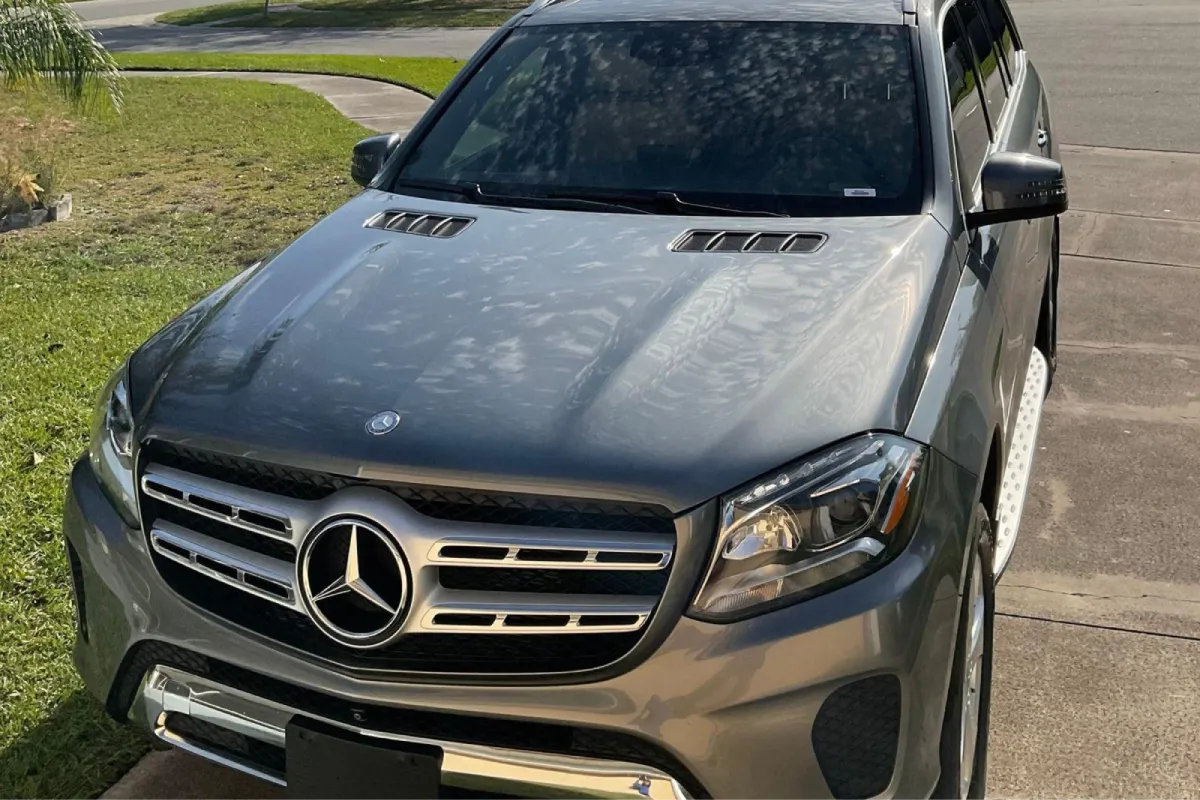 Mercedes SUV with paint protection film on the front hood.
